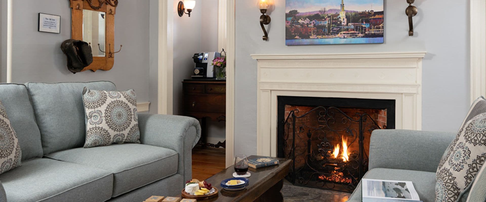 Cozy living room featuring a fireplace, comfortable sofas, and decorative accents.